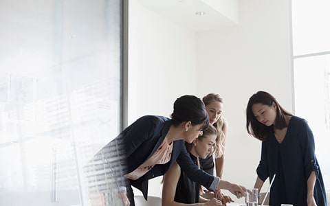 group of people looking at screen 