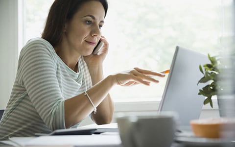 Woman looking at the computer screen